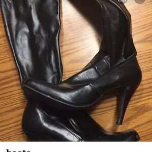 Black pleather gently worn heeled boots.